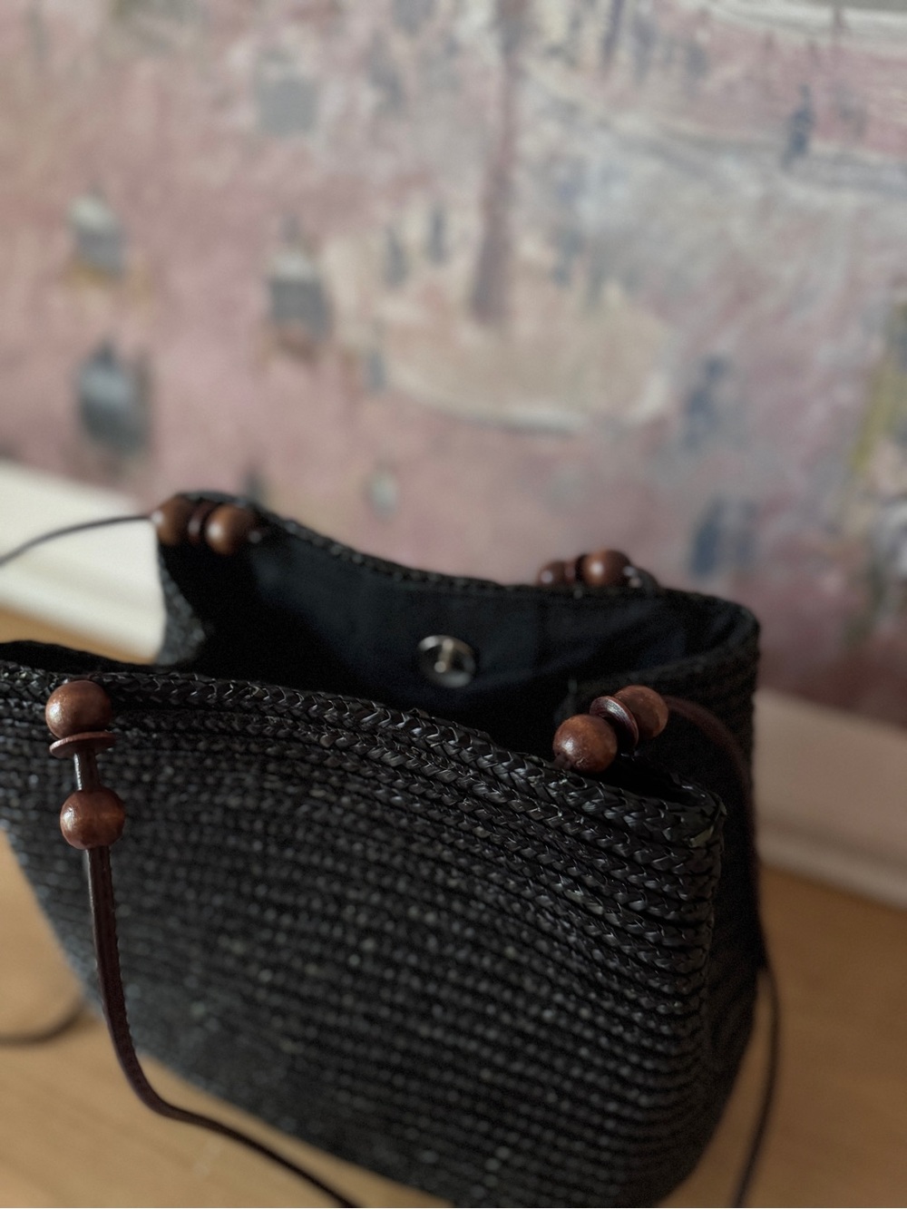 Elegant Black Wheat Straw Bucket Bag with Brown Decorative Straps - Picture 3 of 7